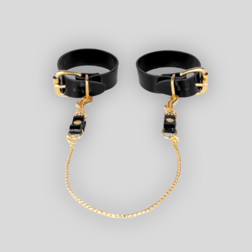 SAXOS Slimcuffs mit 2 cm breiten schwarzen Echtlederriemen und goldfarbenen Beschlägen